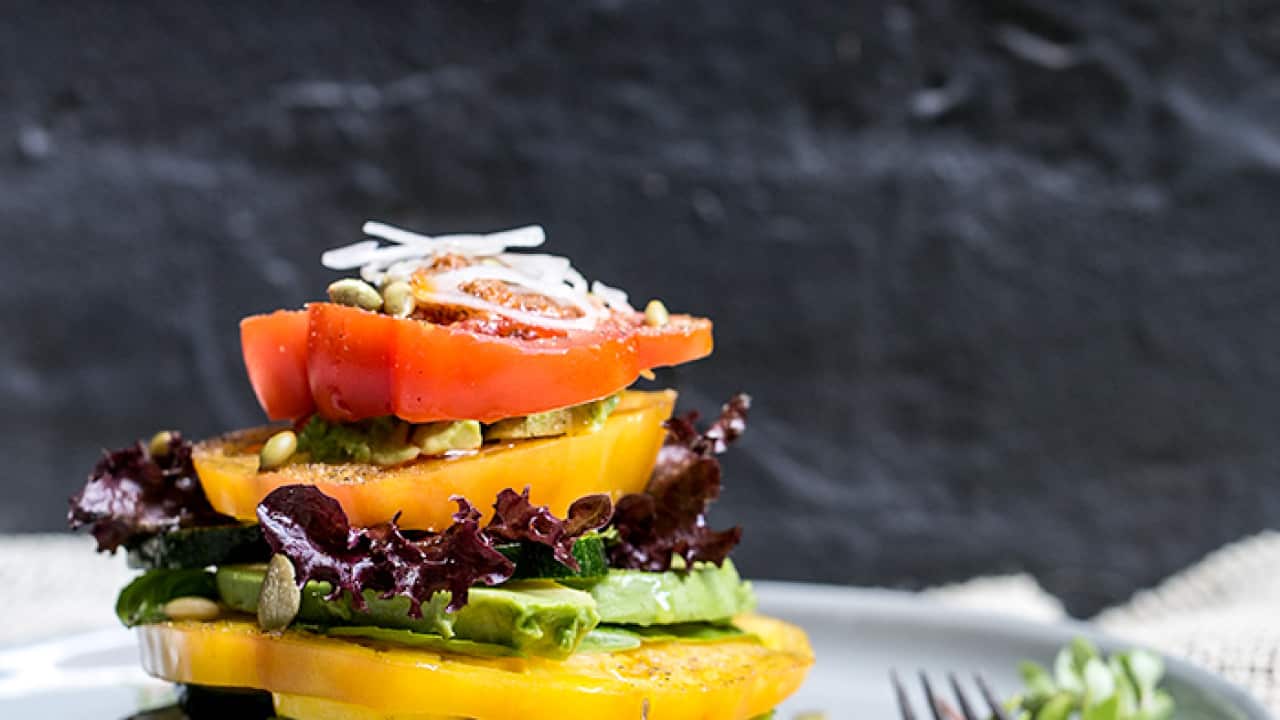 Heirloom tomato, avocado and zucchini stacks