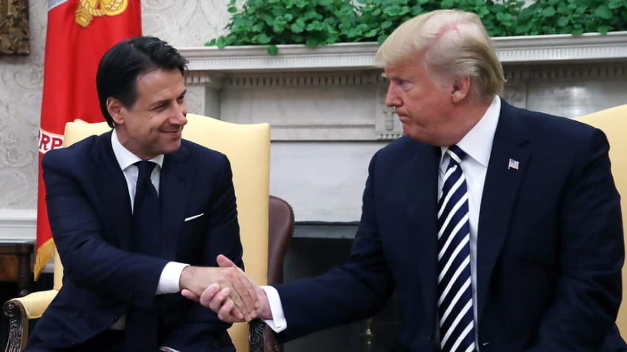 US President Donald J. Trump (R) shakes hands with Italian Prime Minister Giuseppe Conte (L) in the Oval Office of the White House, in Washington, DC, USA, 30 July 2018. EPA/Mark Wilson / POOL ISP POOL