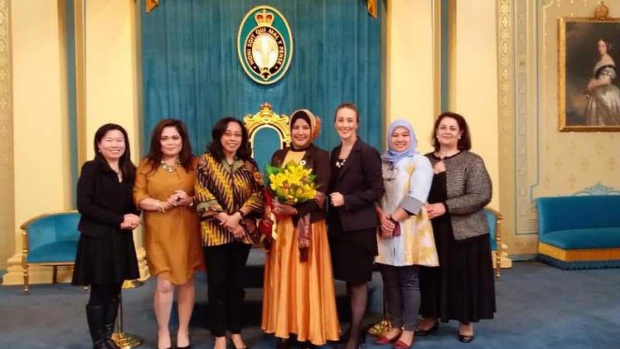 Nika Suwarsih (centre) flanked by Ms Spica Tutuhatunewa (left) and Ms Gabrielle Williams (right) and friends at the Government House after receiving Premier’s Volunteer Champions award, Melb Sep 9, 2018.