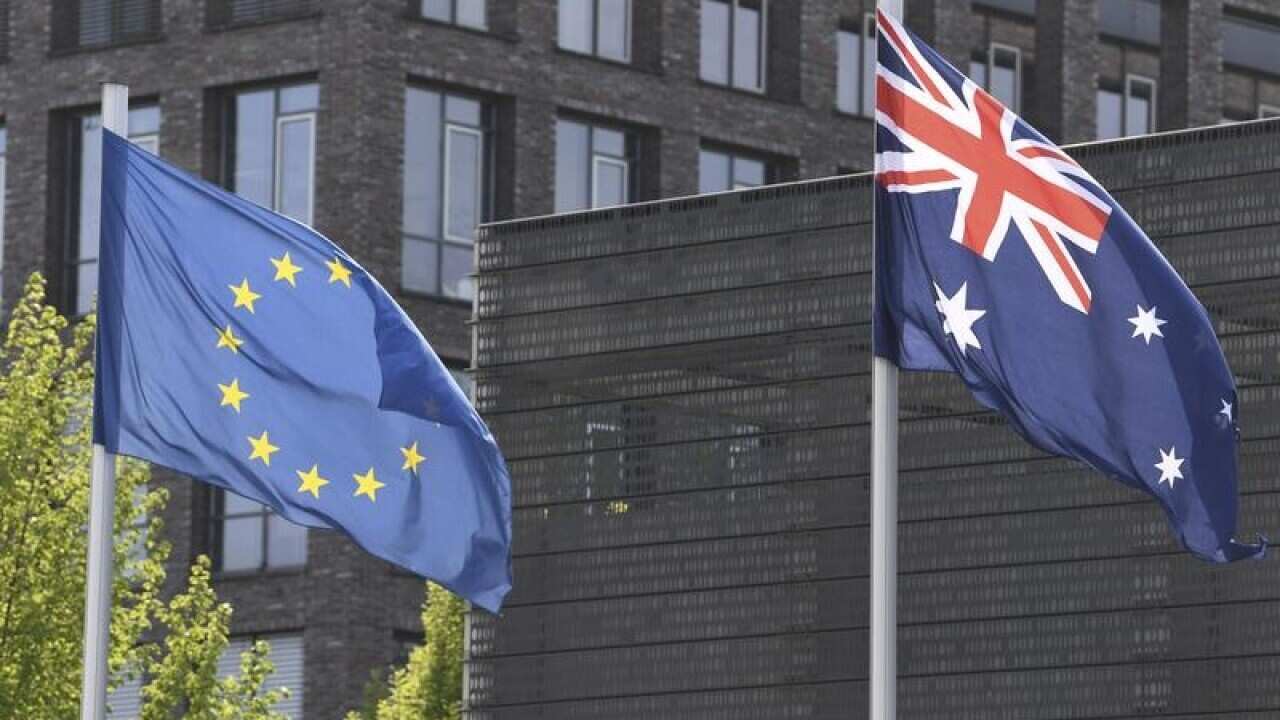 The Australian flag and the flag of the European Union