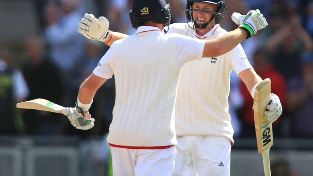 England's Joe Root and Ian Bell celebrate victory over Australia