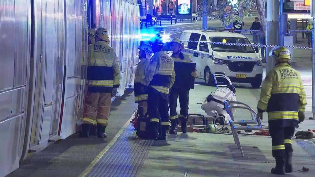 A 16 year-old girl has died after being trapped under a light rail tram.