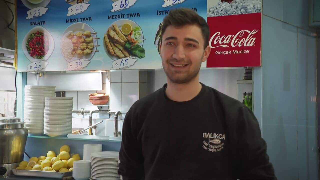 Tarihi Balikca restaurant worker Mahsun Aktas says customers cannot afford oil-driven price rises (AP)