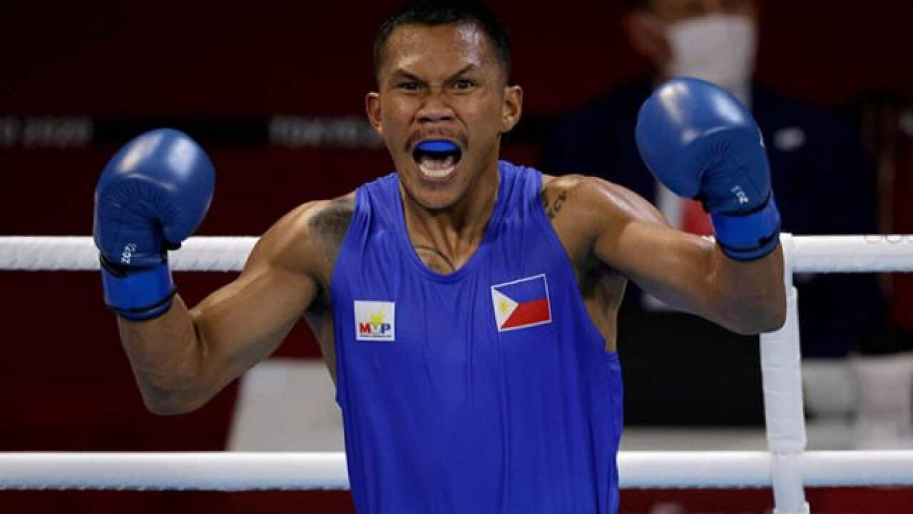 Eumir Marcial of the Philippines reacts after winning his fight against Arman Darchinyan of Armenia at the Tokyo Olympics, Aug. 1. -- REUTERS/Ueslei Marcelino 