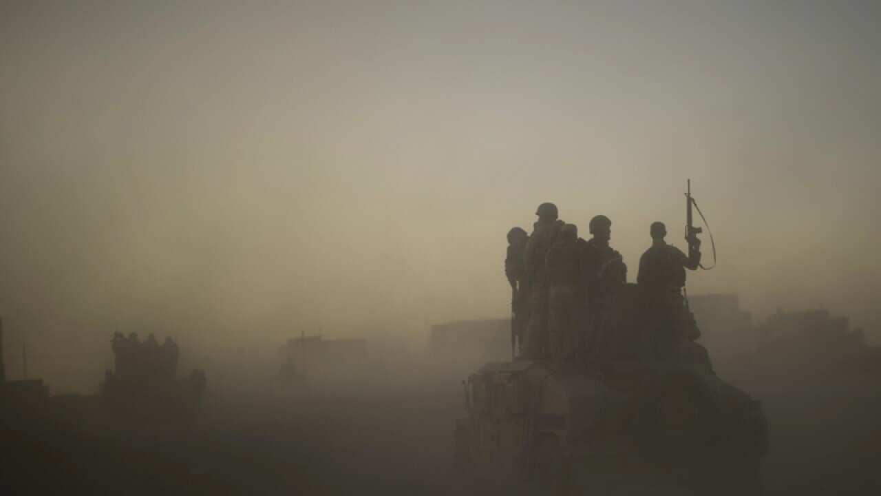An Iraqi Army convoy arrive in Mosul, Iraq