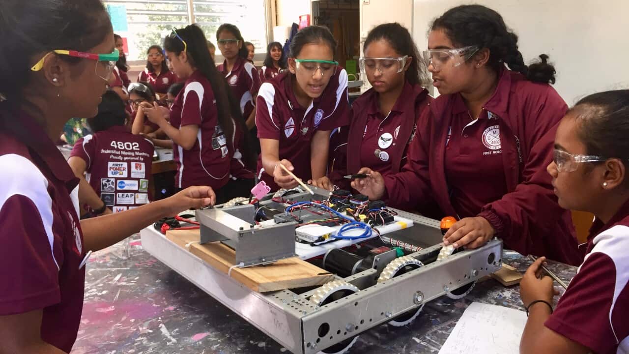 Blacktown Girls High School students prepare their robot for competition in the US.