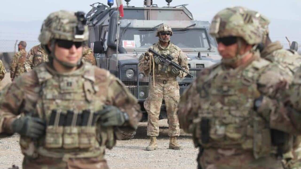 سربازان امریکایی در حال اشتراک در یک جلسه آموزشی ارتش افغانستان در ولایت هرات، فبروری ٢٠۱٩.