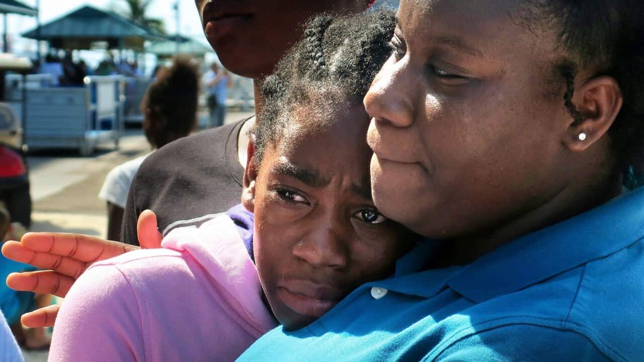 A child from the Freeport Children's Home orphanage, who was evacuated from Freeport, Bahamas, aboard Royal Caribbean's Mariner of the Seas cruise ship