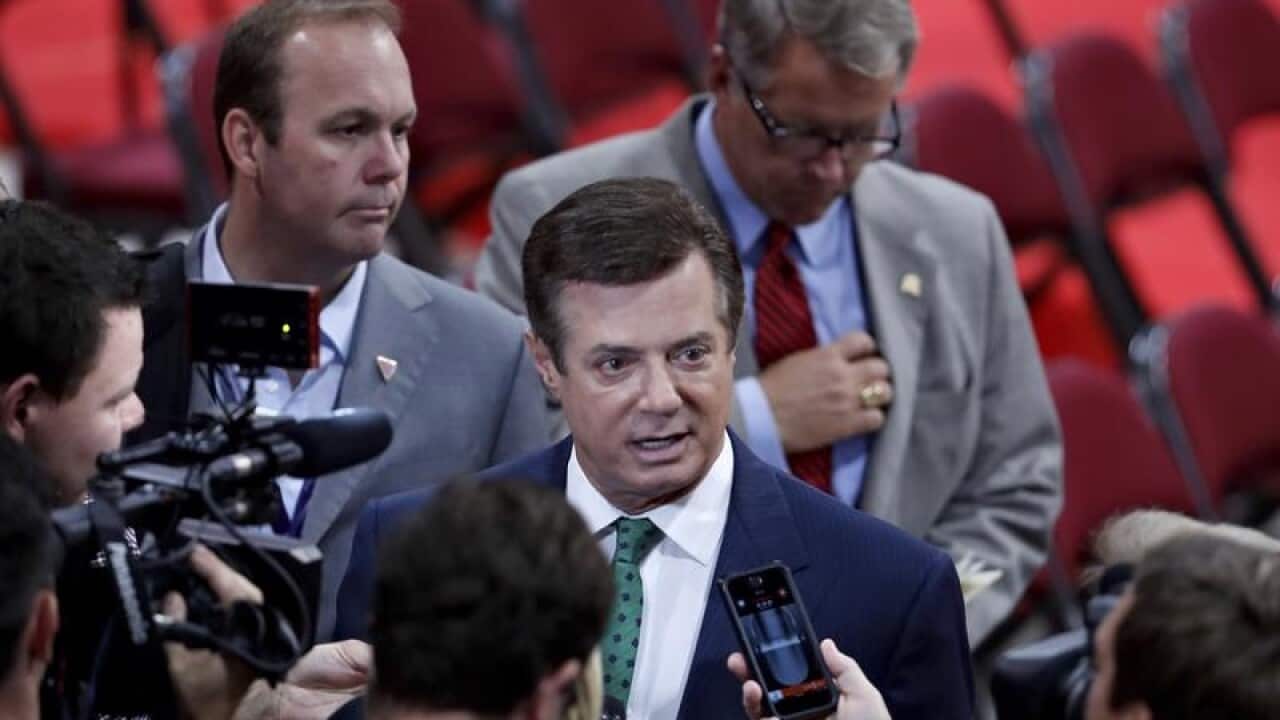 A file picture of Paul Manafort and Rick Gates (left)