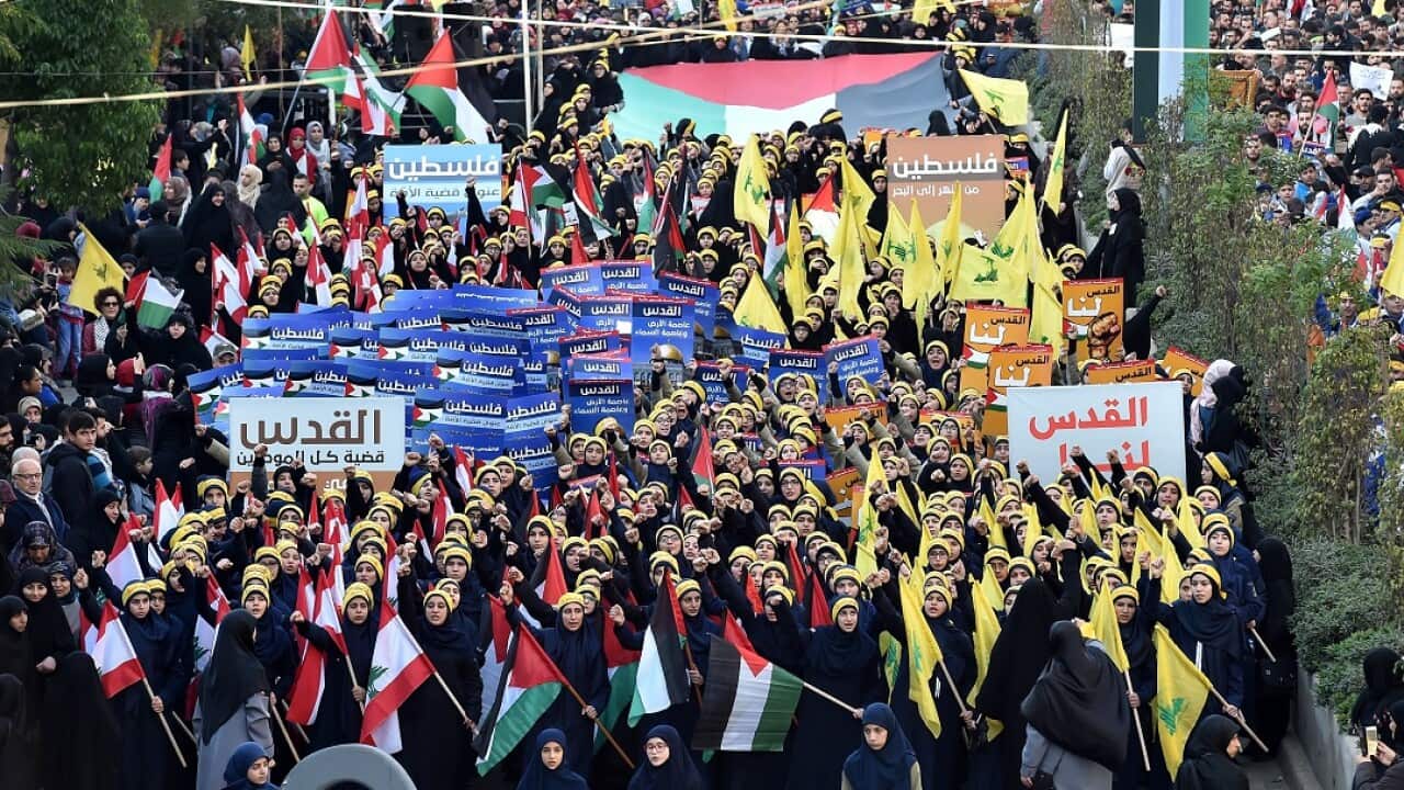 Supporters of Hezbollah protestUS President Donald Trump's decision to recognie Jerusalem as the capital of Israel.