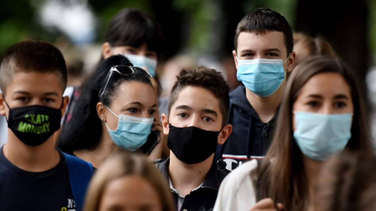 Young people wearing masks