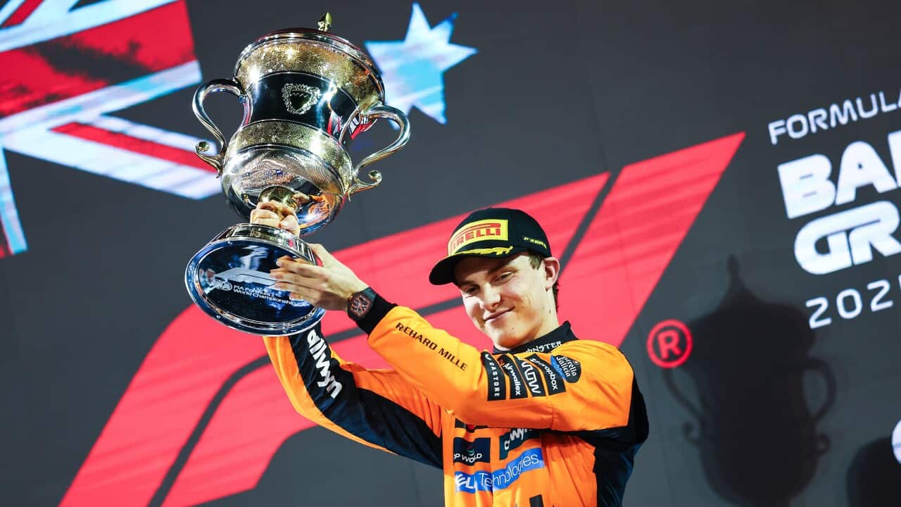 Australia's Oscar Piastri from McLaren F1 Team poses with a trophy after the Formula 1 Gulf Bahrain Grand Prix 2025 win in the 2025 FIA Formula One World Championship