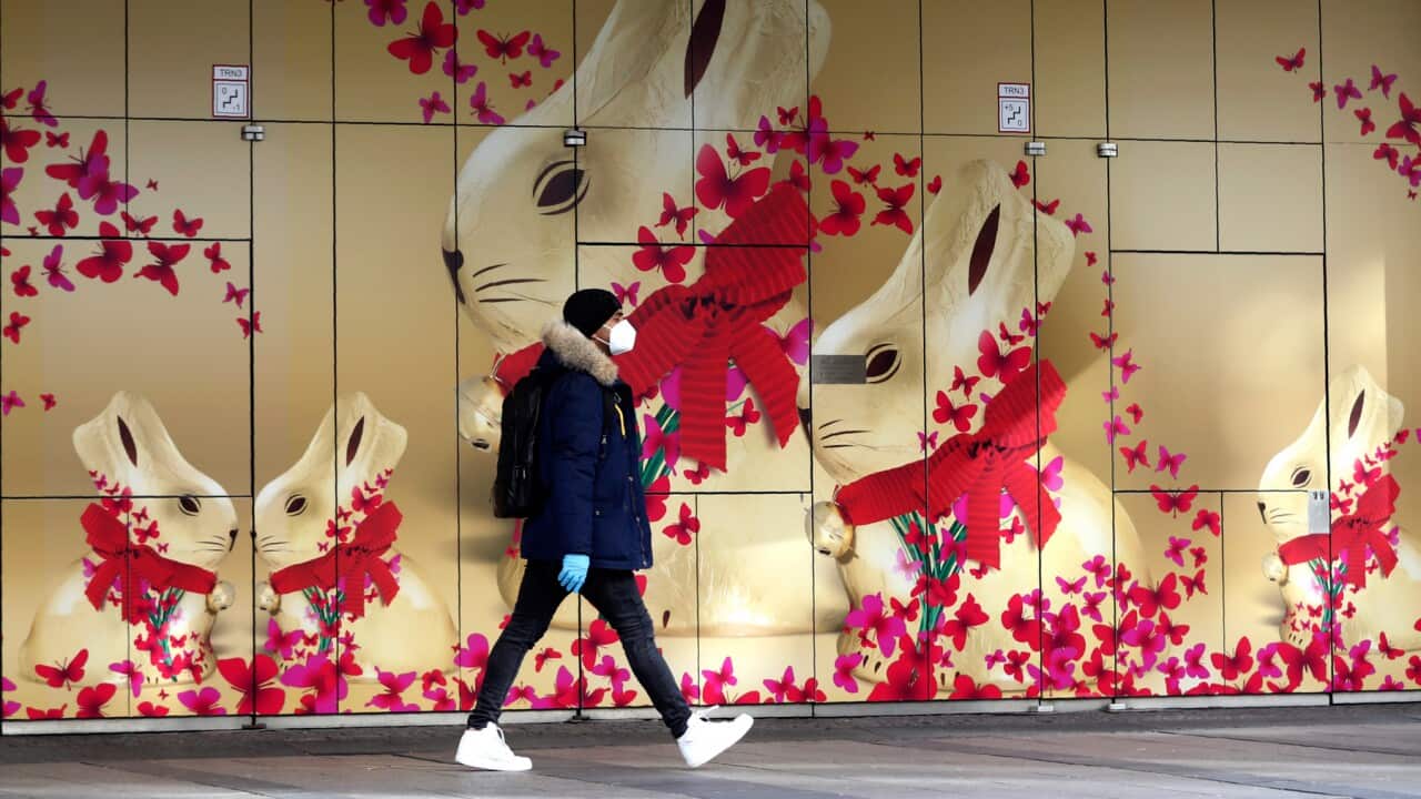 A young man passes Easter advertising in Germany