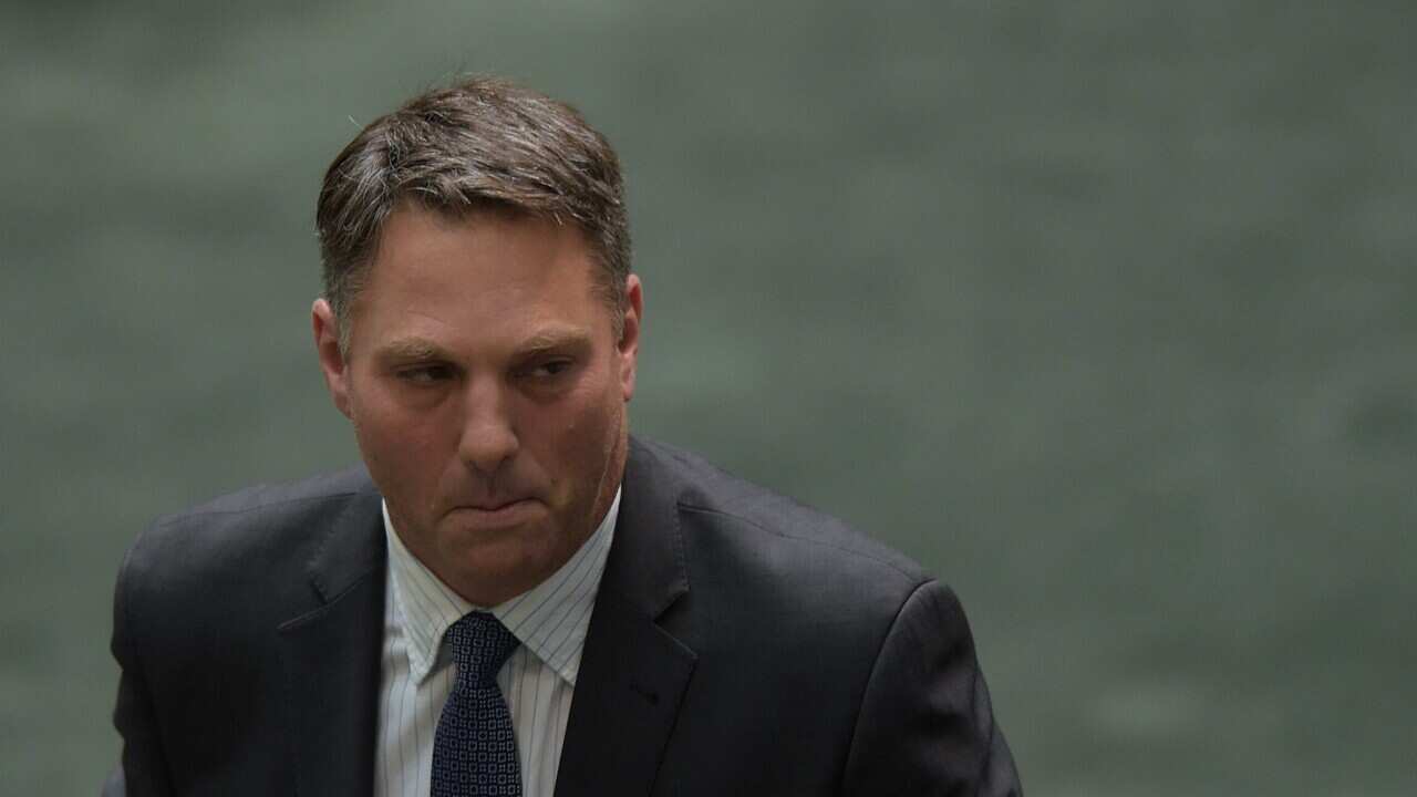 Shadow immigration minister Richard Marles leaves under 94a during House of Representatives Question Time in Canberra, Thursday, Feb. 12, 2015. (AAP Image/Lukas Coch) NO ARCHIVING