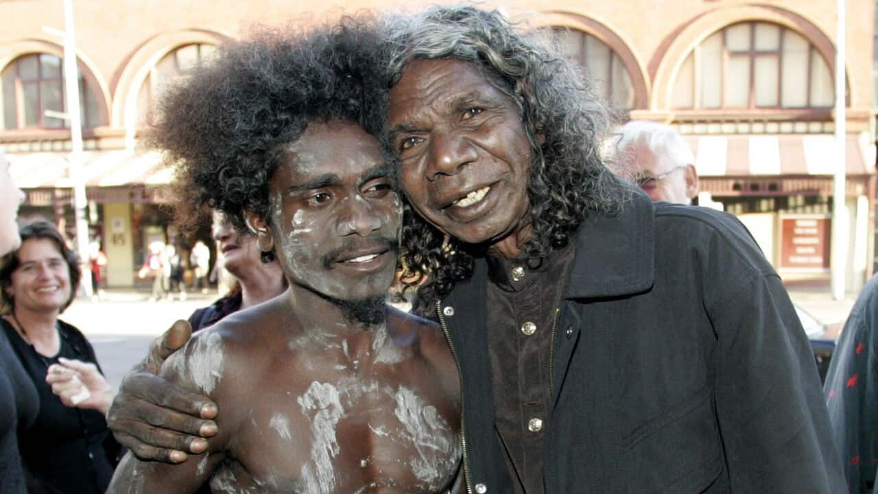 Yolŋu actor David Dalaithngu (right) poses for a photograph with his son Jamie Gulpilil