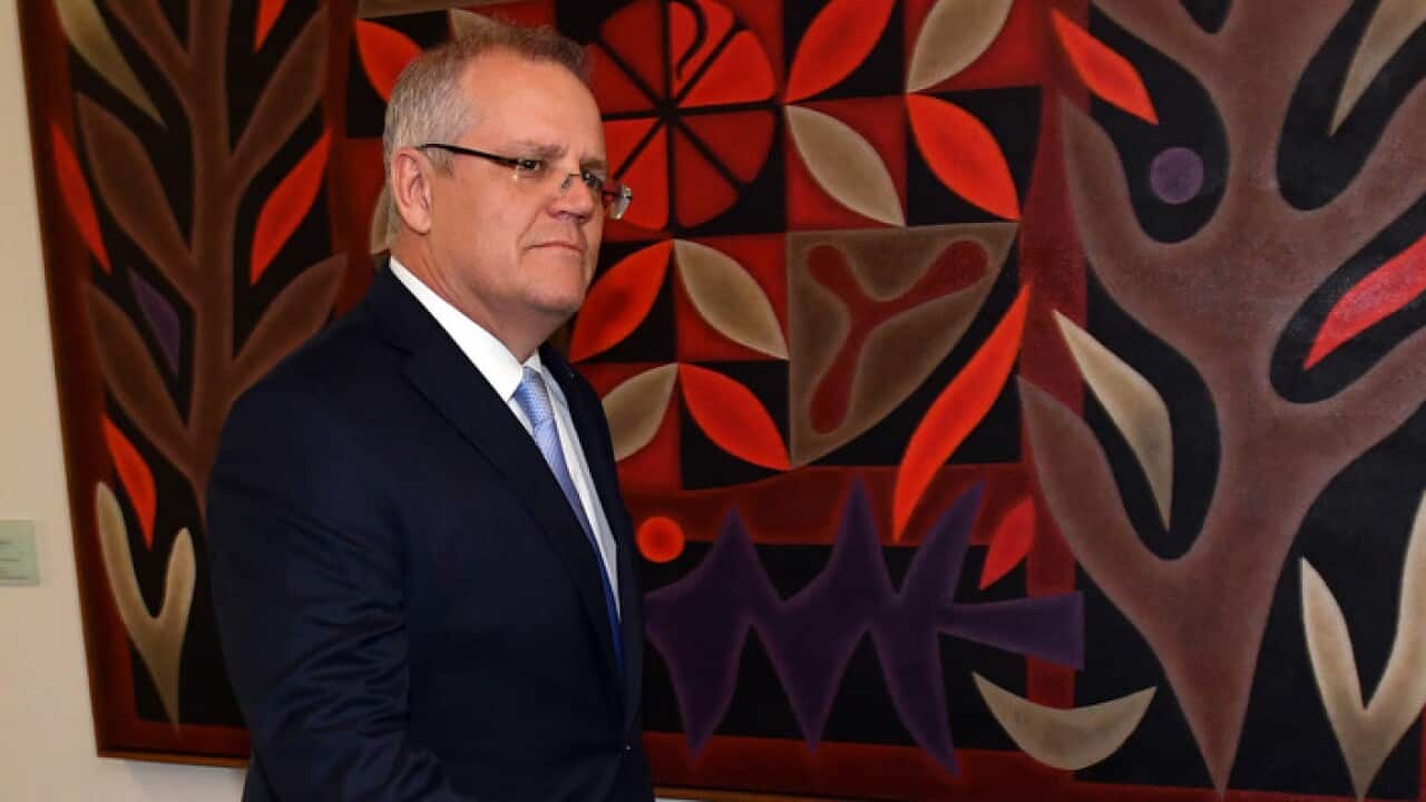 Scott Morrison arriving for the party-room meeting
