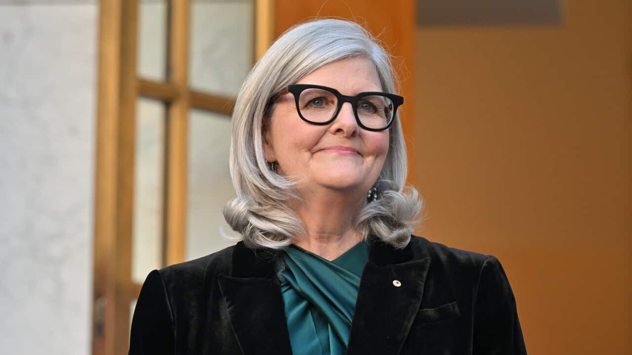 A woman wearing glasses