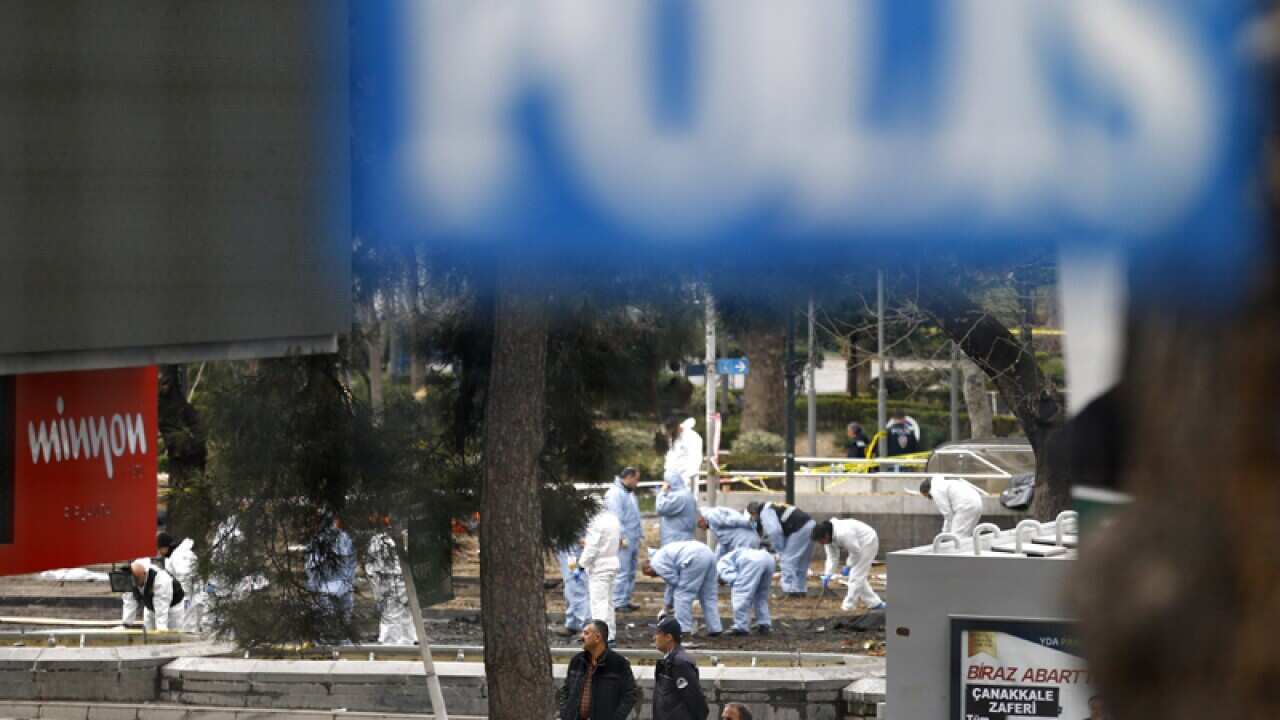 Crime officers search the area after an explosion in Ankara