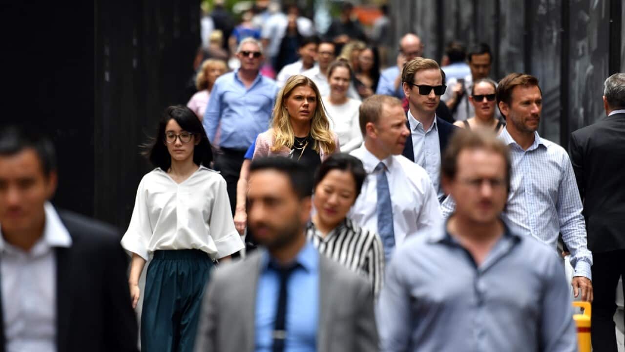 Office workers are seen at lunch break at Martin Place in Sydney, Wednesday, December 12, 2018. (AAP Image/Mick Tsikas) NO ARCHIVING