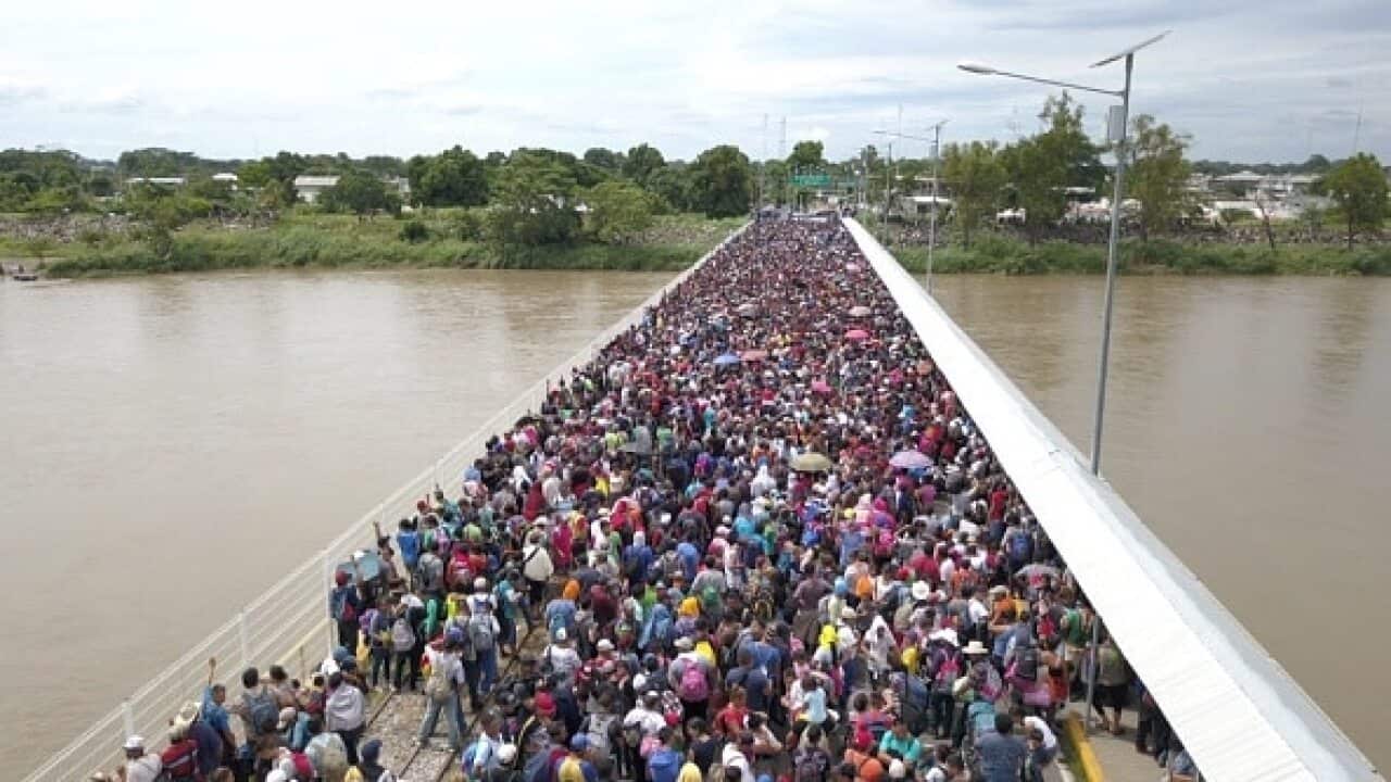 Thousands of migrants from Honduras are waiting on the border between Guatemala and Mexico.