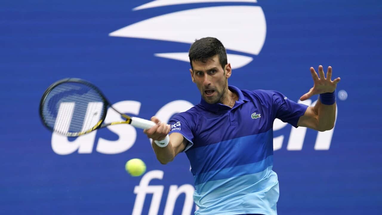 Novak Djokovic returns a shot to at the US Open final in 2021. 