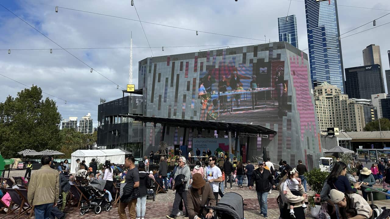 People attend a festival at Federation Square in Melbourne.