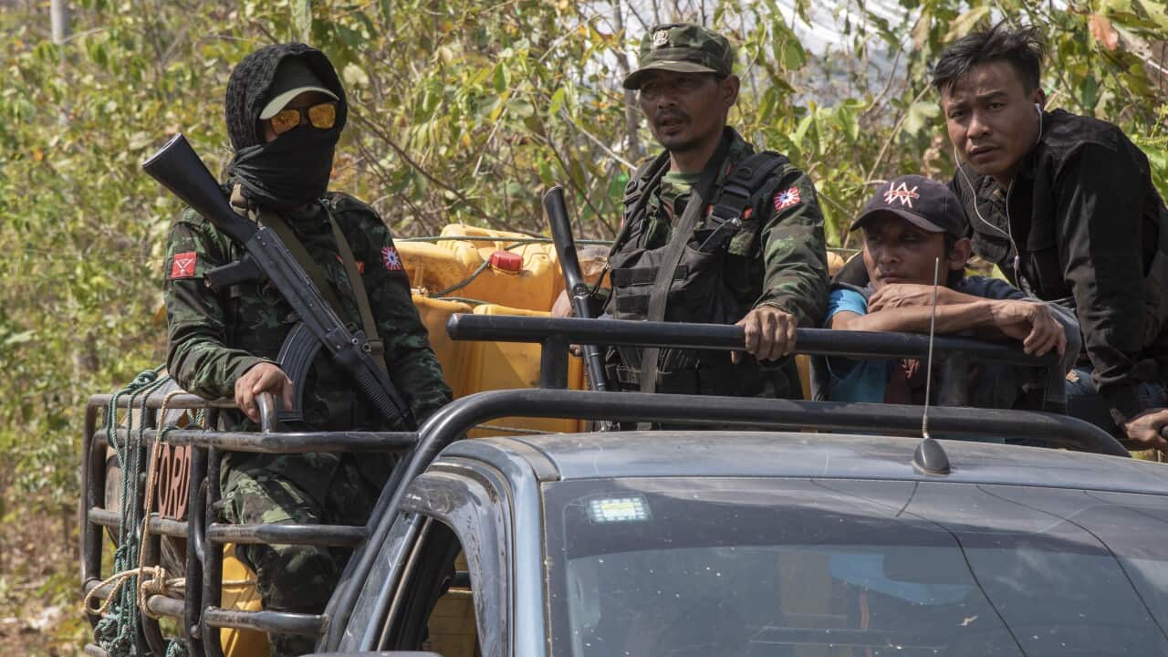 Soldiers from the Karenni Army (KA) are ridding a truck on