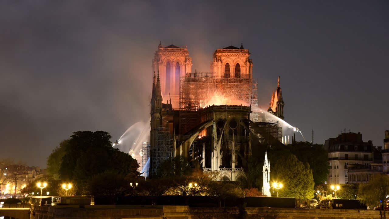 A huge fire swept through the roof of the famed Notre-Dame Cathedral in the French capital, sending flames and huge clouds of grey smoke billowing into the sky.