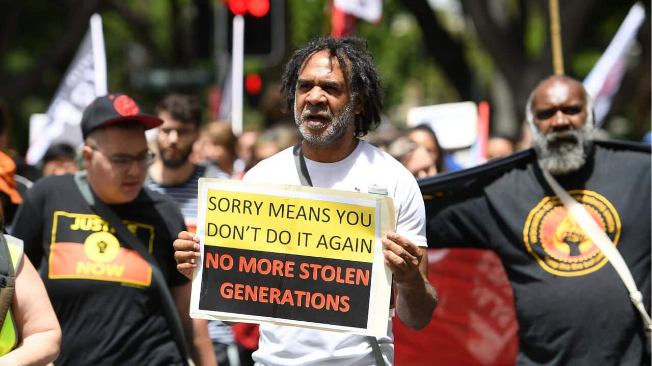 A rally is held for the anniversary of the national apology