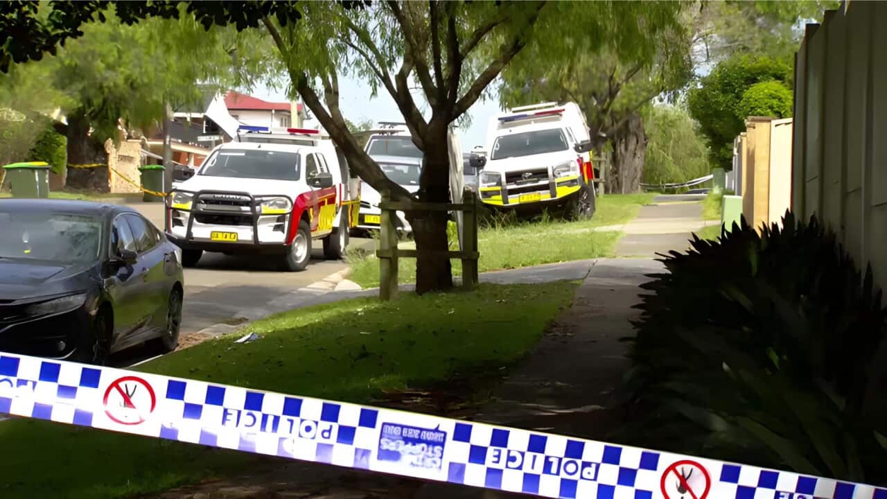 Police vehicles outside the pre-school targeted by an arson attack (SBS).jpg
