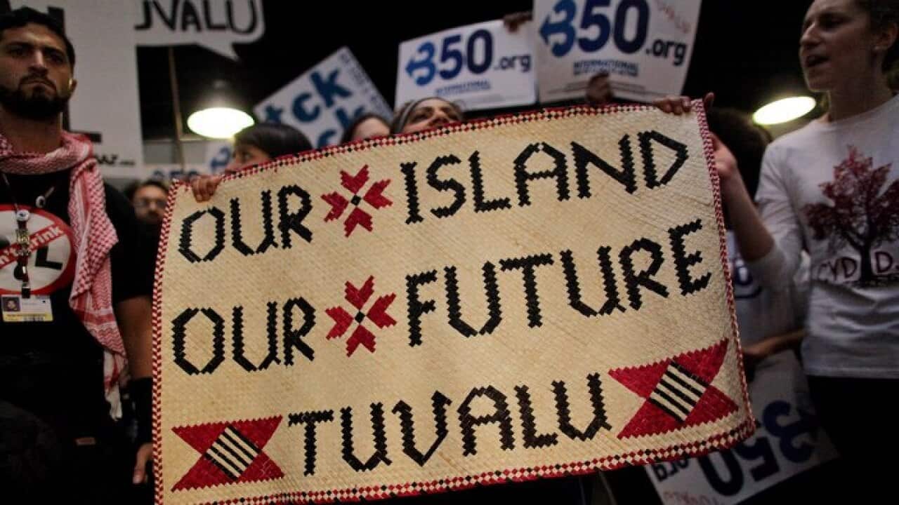 Tuvalu protesters at a 2009 UN climate summit