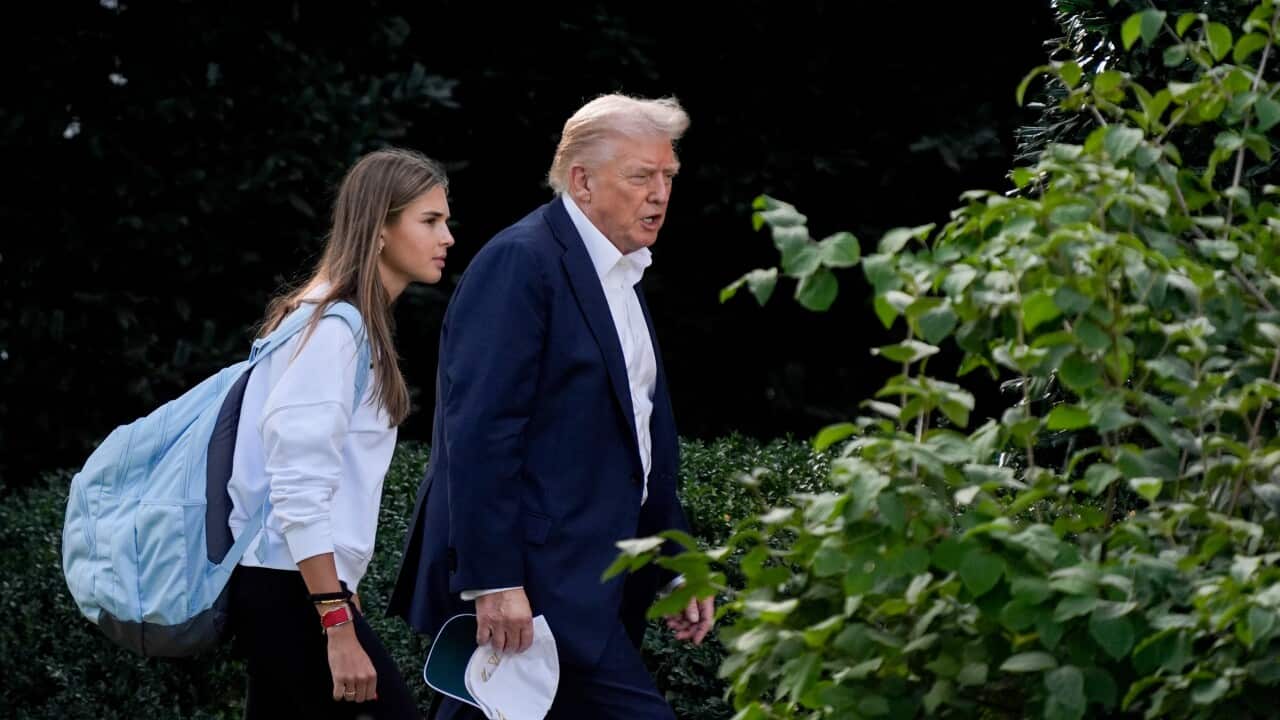 US President Donald Trump and granddaughter Kai Trump