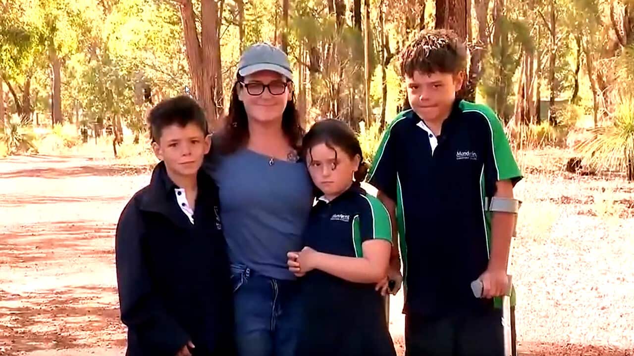 WA teen with his family