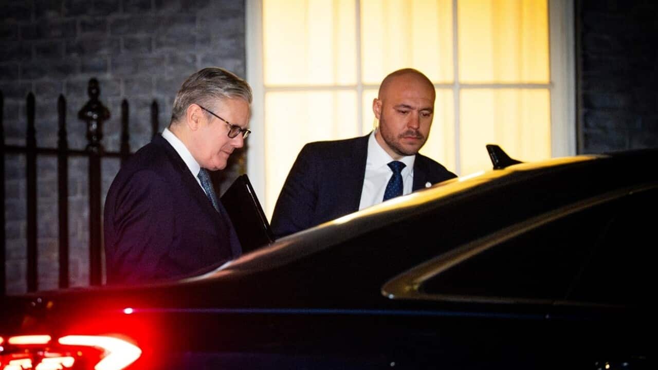 UK Prime Minister Keir Starmer enters a car outside No 10 Downing Street in London.jpg