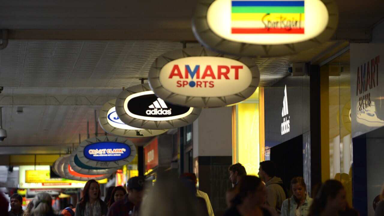 People walk through Brisbane's Queens Street Mall