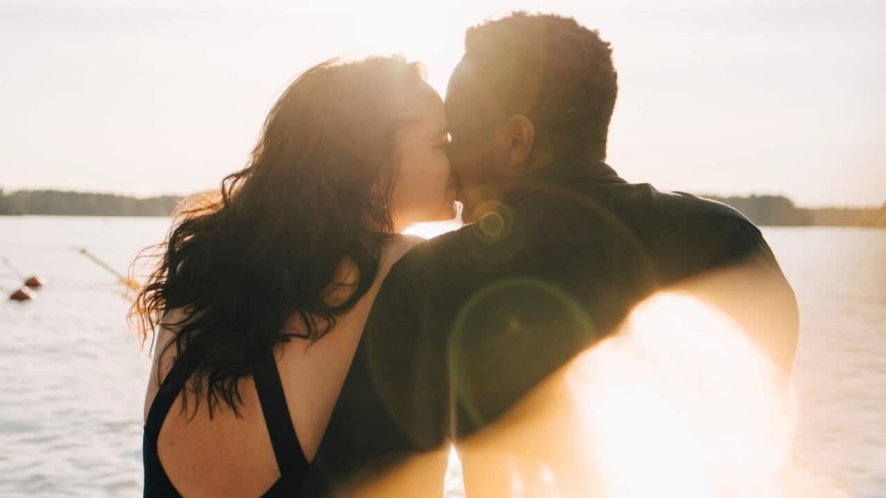 A couple kissing
