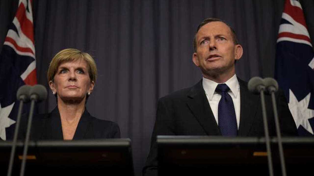  Tony Abbott and Julie Bishop speak to the media during a press conference at Parliament House in Canberra (AAP)