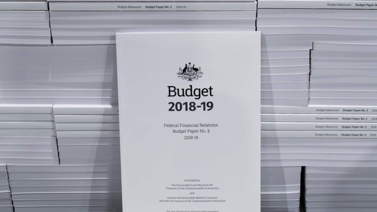 The cover of the 2018-19 Budget papers is seen at Canprint in Canberra, Sunday, May 6, 2018. Australia's Treasurer Scott Morrison will deliver his third Budget on Tuesday, May 8. (AAP Image/Lukas Coch) NO ARCHIVING