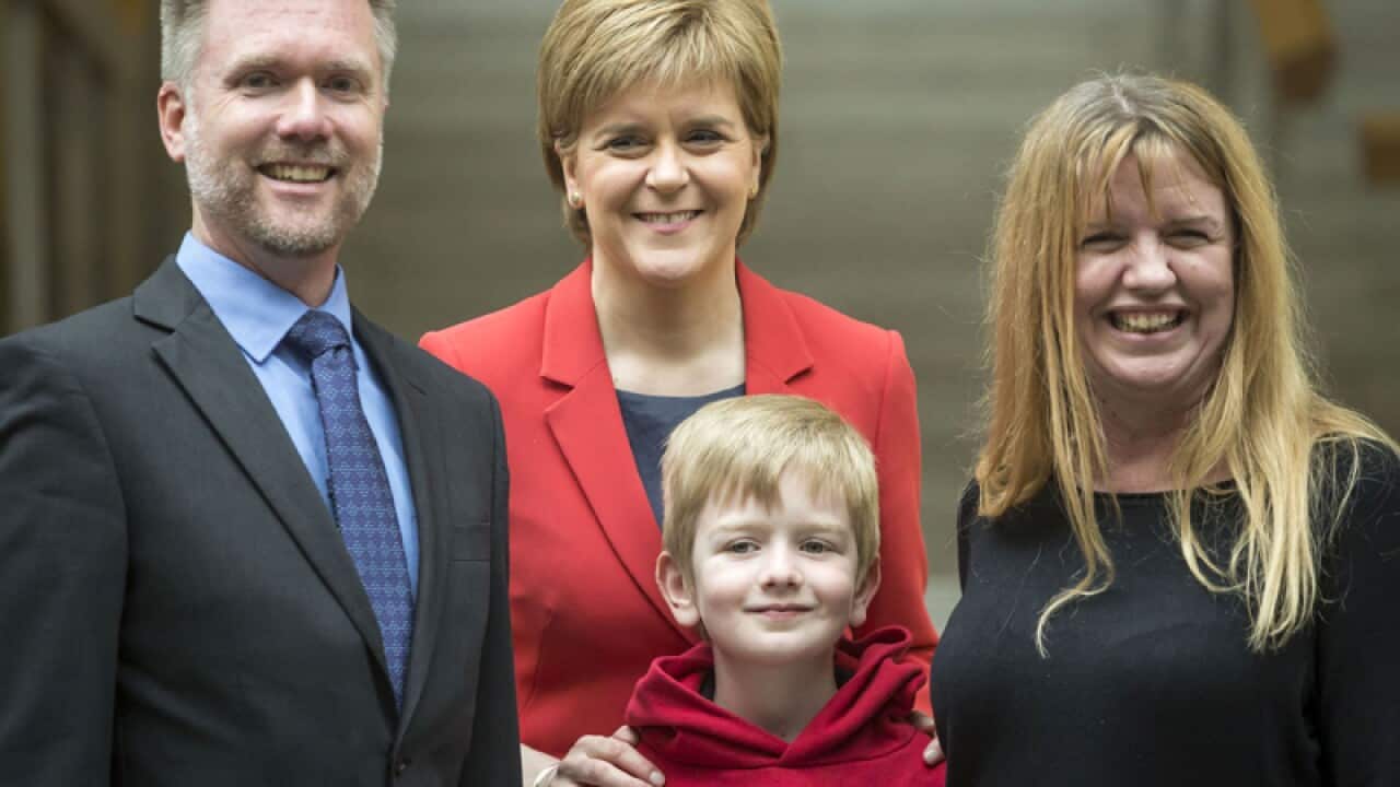 Australian family Gregg (L), Kathryn (R) and Lachlan Brain