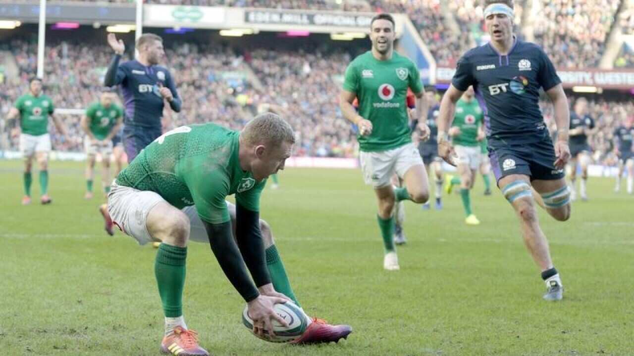Ireland's Keith Earls scores against Scotland