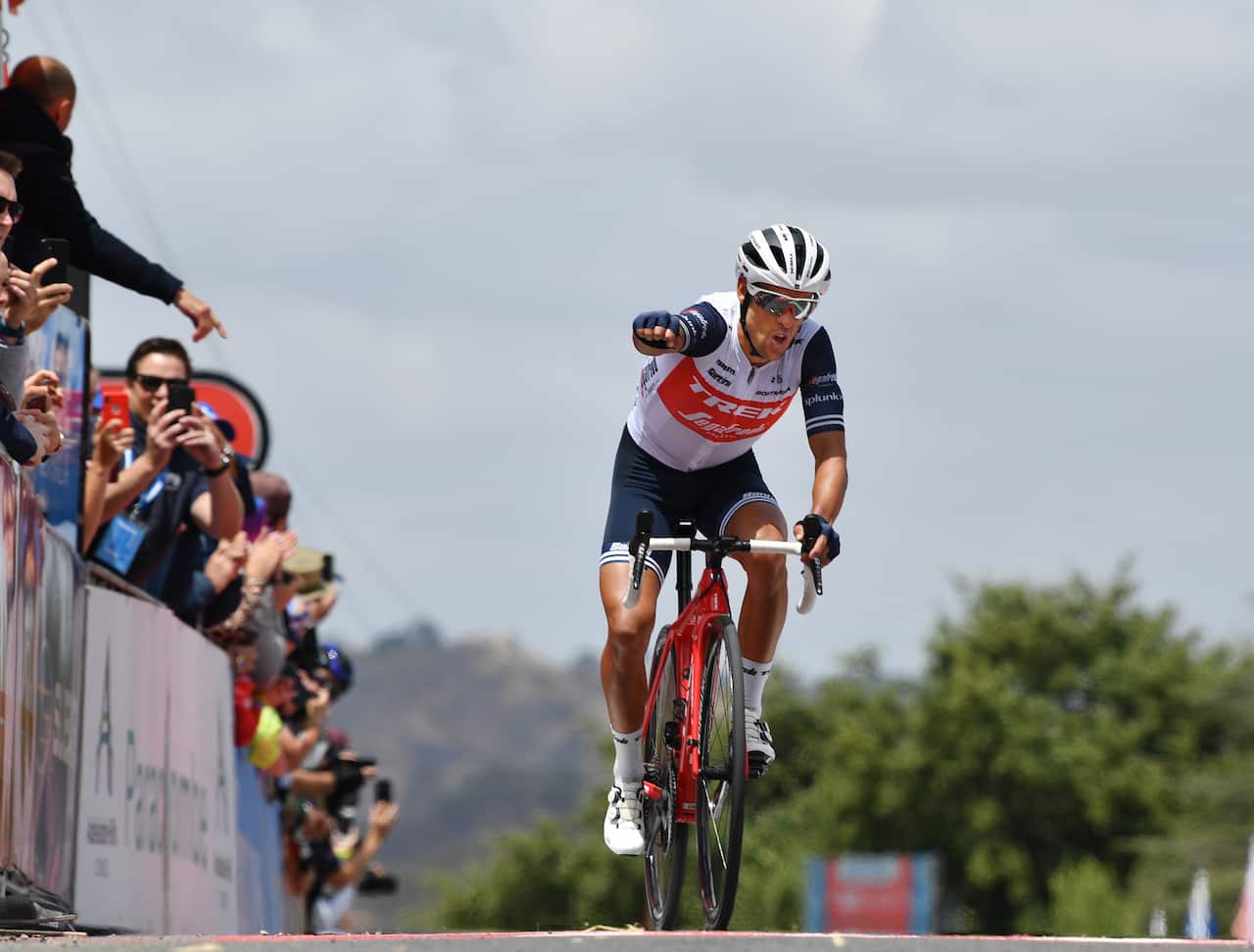Richie Porte celebrates after winning Stage 3 of the Tour Down Under atop Paracombe and moved into the leader's jersey