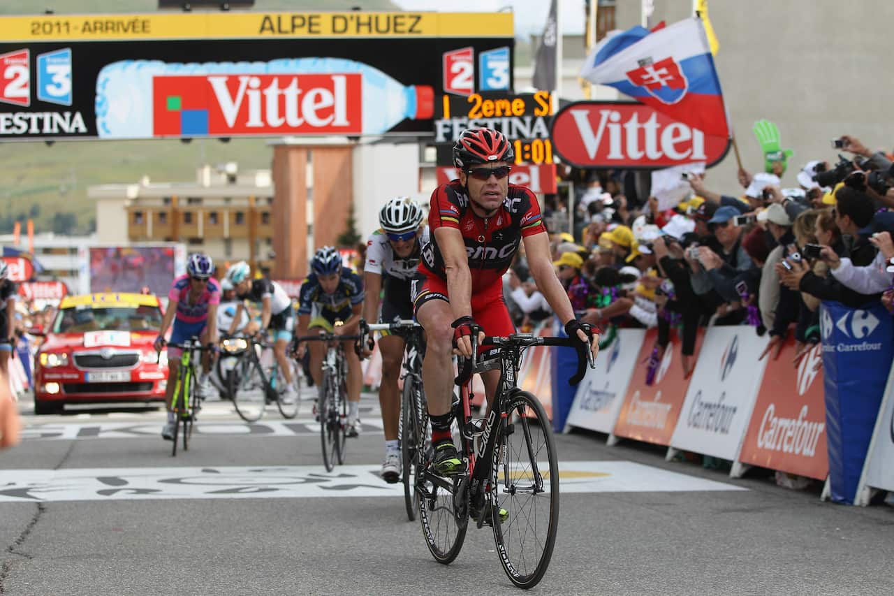 Held firm... Cadel Evans did what he needed to do on Alpe d'Huez in 2011, before taking the race lead on the penultimate day's time trial in Grenoble.