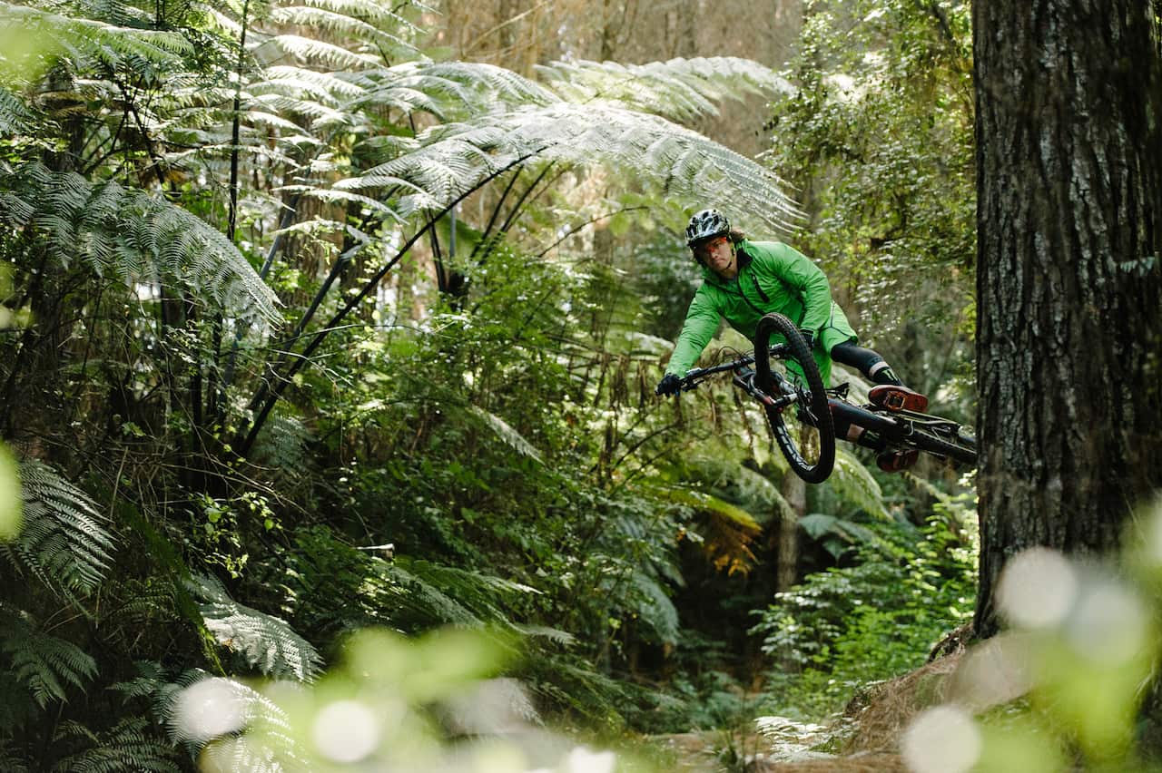 Mitch Ropelato flies sideways through the air on a bike