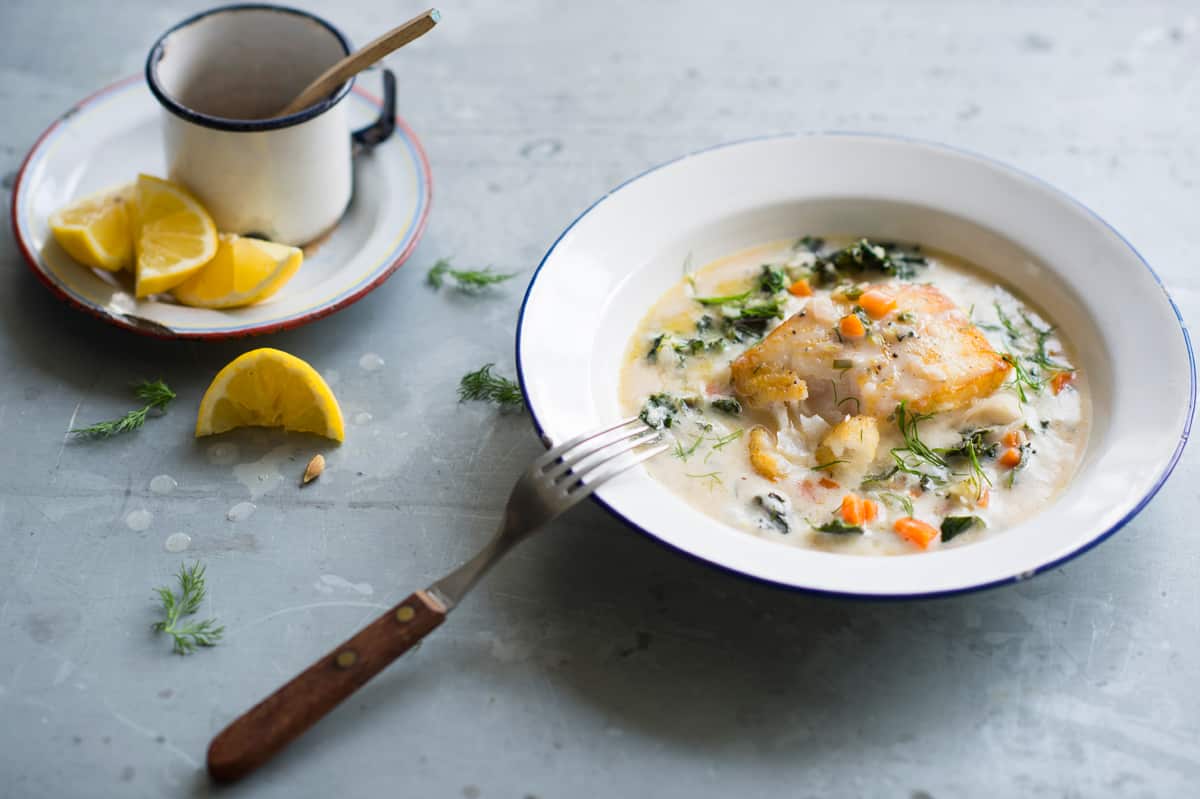 Pan-fried fish with avgolemono braised greens