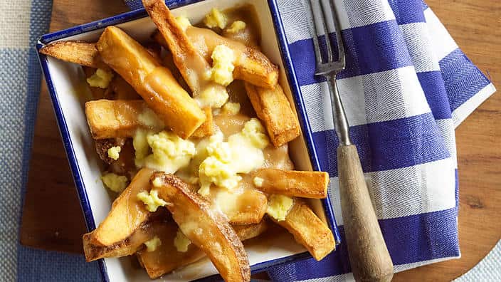 Fries with gravy and cheese curds (poutine)