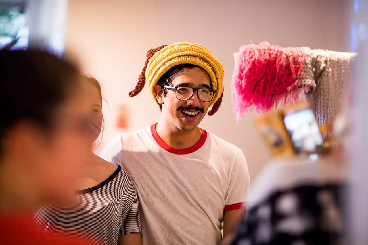 Phil Ferguson in a pancake hat at the exhibition. 