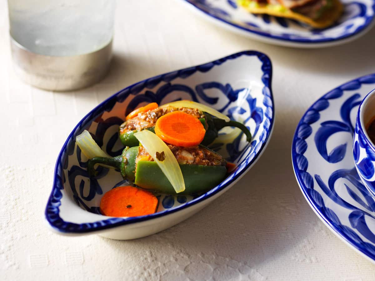 Chiles rellenos en escabeche are stuffed pickled jalapeños.