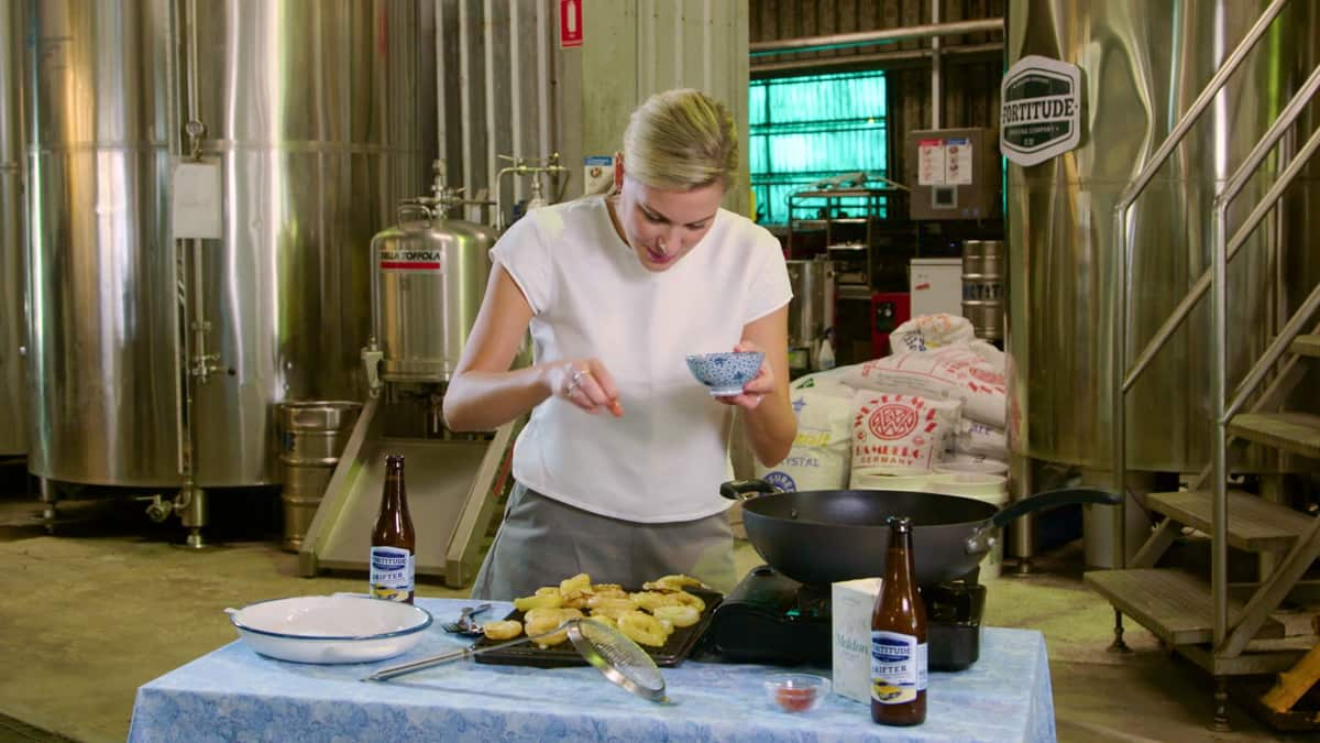 Justine Schofield cooking onion rings in Tropical Gourmet Queensland 