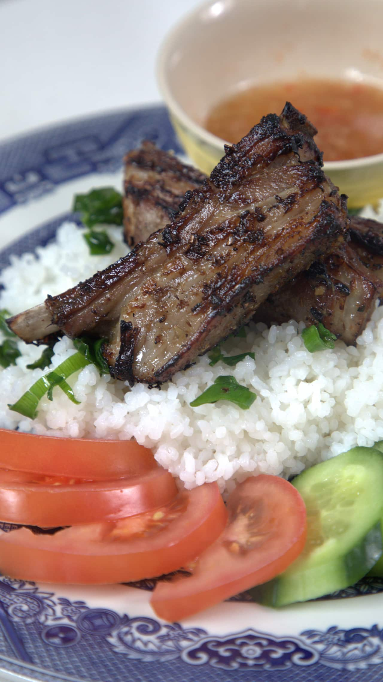 Vietnamese broken rice with lamb ribs (com tam suon cuu)