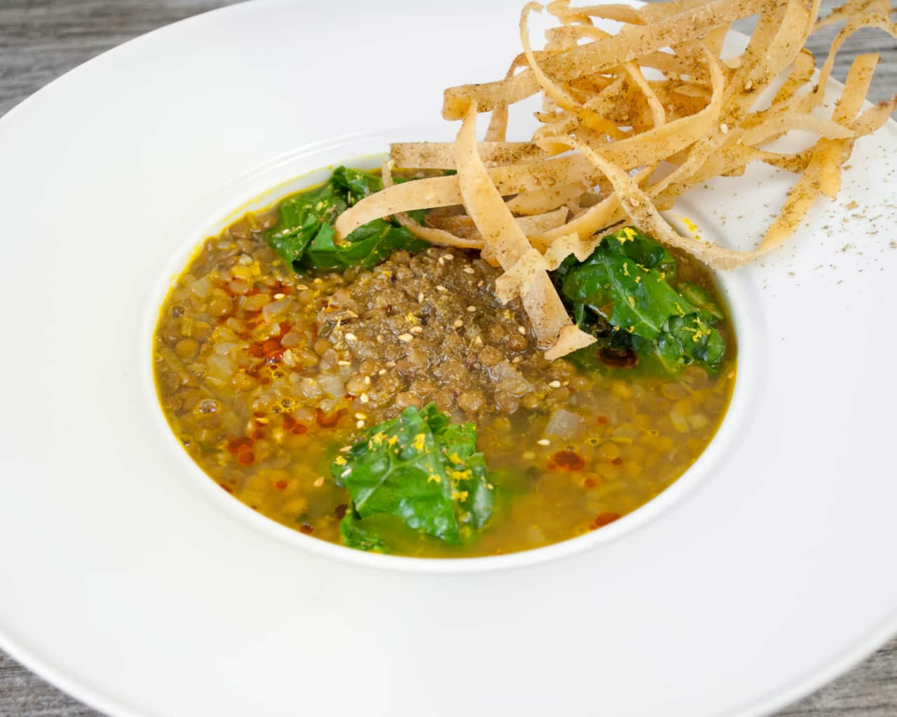 Lentil soup with crispy pita